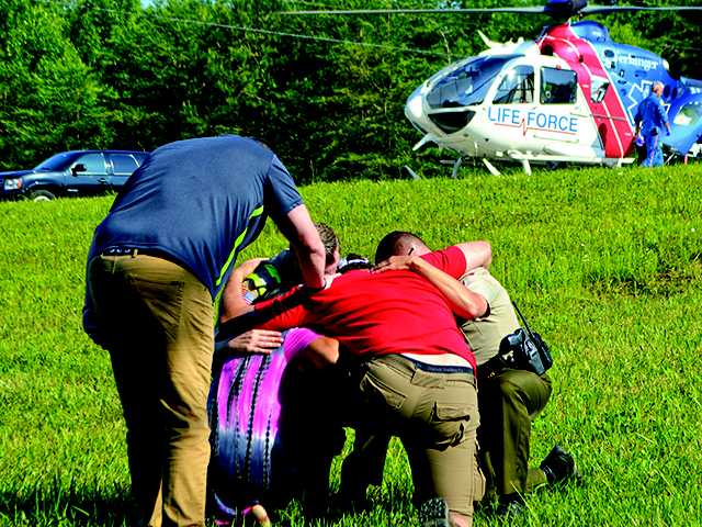 Teen airlifted after side-swiping semi Teen airlifted after side-swiping semi