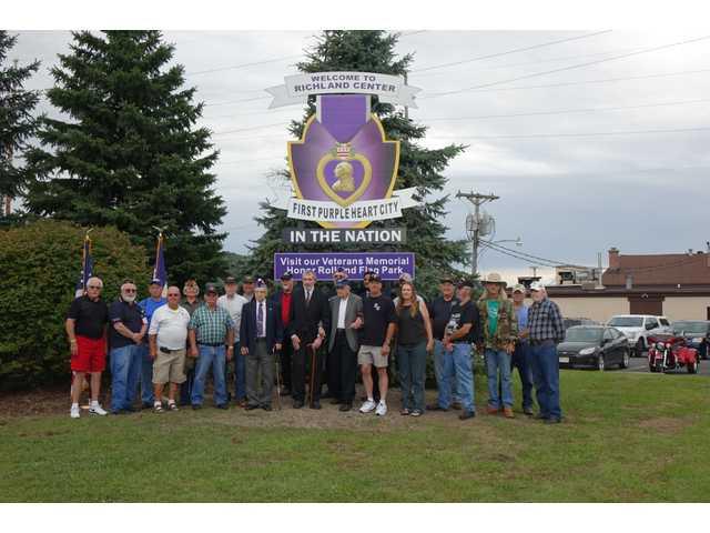 First Purple Heart City acknowledged with sign First Purple Heart City acknowledged with sign