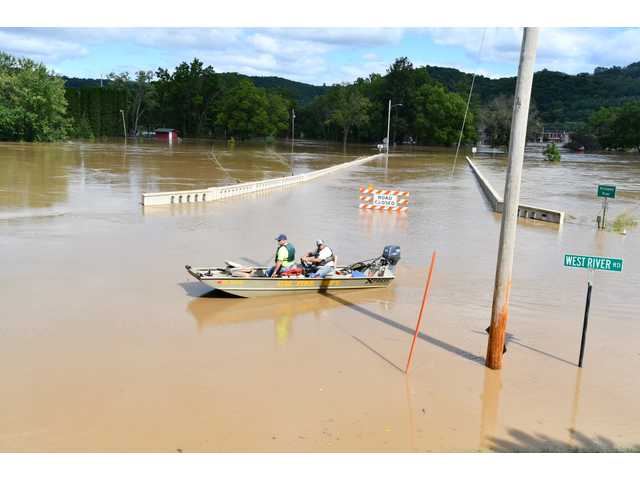 Record flooding devistates area Record flooding devistates area