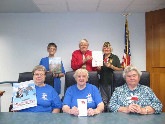 Help veterans on Buddy Poppy Day Help veterans on Buddy Poppy Day