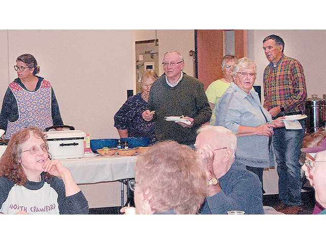 Community supper helps residents to heal after the trauma of flooding Community supper helps residents to heal after the trauma of flooding